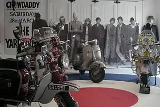 Tentoonstelling van scooters die in de rockopera Quadrophenia (The Who, 1973) werden gebruikt.