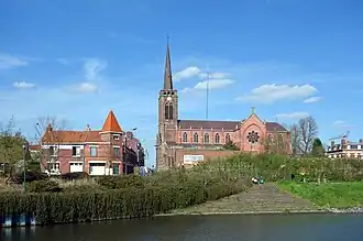 Zicht op de kerk vanaf de Deule