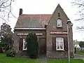 Portiers- of conciërgewoning van het kasteel Ten Broucke