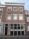 Pand dat deel uitmaakt van de goede gevelwand: Wijnstraat 9-39