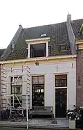 Woonhuis met begane-grond en hoog zadeldak