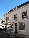 Zijgevel van het winkelhuis hoek Nieuwe Boogerdstraat- St.Domusstraat