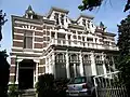 Herenhuis in neorenaissancestijl met tuinhek