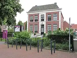 Pastorie met aangebouwd koetshuis