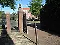 Begraafplaats: toegangshek
