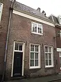 Oorspronkelijk koetshuis van nr 27