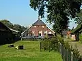 In hoofdvorm gaaf bewaarde boerderij van het Staphorstse type