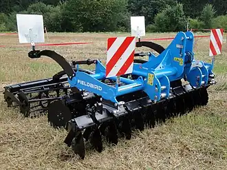 Blauwe schijveneg met zwarte schijven