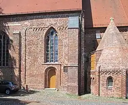 Bewaard gebleven 12e-eeuws fragment van deze kerk