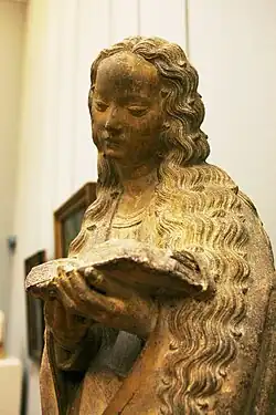 Lezende heilige. Beeld toegeschreven aan de werkplaats van Juan de la Huerta. Dijon