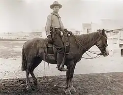Edmond als cowboy
