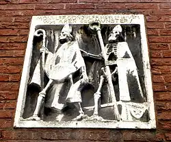 Gevelsteen in de Klappergasse in Aken van Dries Engelen