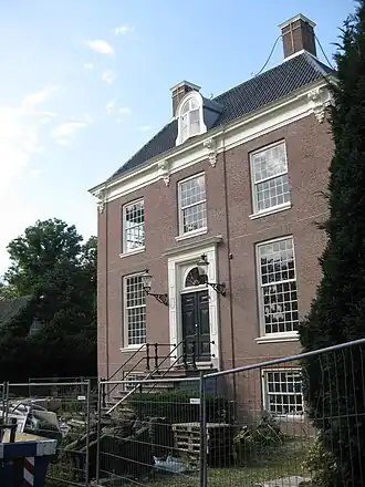 Amstelrust met koetshuis