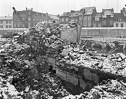 Opgraving stadsmuur op bouwterrein Molenhof (1970)