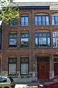Herenhuis tezamen met Brugstraat 25 als een dubbel huis gebouwd
