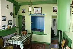 De huiskamer met bedstede