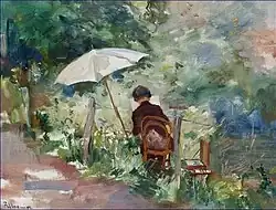 Schilder met parasol in 't landschap