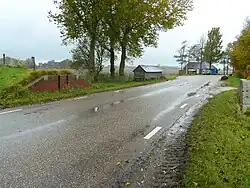 Dijkcoupure en schotbalkhuisje