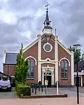 Gereformeerd vrijgemaakte kerk aan de Hooilandse weg met neoclassicistische gevel. Gebouwd in 1871 als gereformeerde kerk.