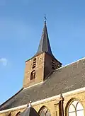 Toren der Nederlands Hervormde Kerk. Toren, die in een latere periode verhoogd is. Mechanisch torenuurwerk, A. Vos en Zn., 1906, buiten gebruik