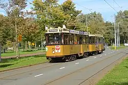 Vierasser-tramstel 303 + 1001 op de Burgemeester Oudlaan.