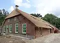 Woonhuis, voormalige boerderij +bijgebouwen