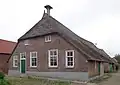 In hoofdvorm gaaf bewaarde boerderij van het Staphorstse type