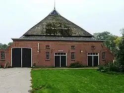 Gevelstenen in de westelijke Teenstraplaats (1798, 'Ruigezand' en 1910)