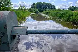 Ruiten Aa gezien naar het zuiden vanaf de stuw ten noorden van de splitsing met het Veelerdiep