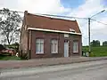 Voormalige herberg Saint Pierre en vlaswerkerwoning