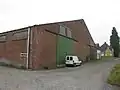 Dieper in gelegen voormalige vlasfabriek met roterij, zwingelarij en bijhorende woning