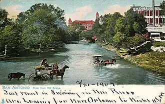 De San Antonio River gezien vaop de Mill Bridge (postkaart uit 1907)
