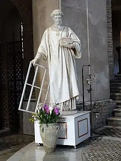 Cultusbeeld van de heilige Laurentius, met rooster en geldbeurs.