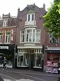 Woonhuis/winkel (ontsluiting bovenwoning via Laan 2c)
