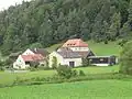 De 15e-eeuwse boerderij met voormalige watermolen Flemmühle