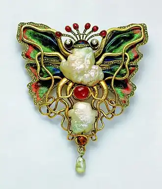 Broche met vlinder en octopus