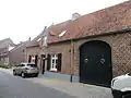Langgevelboerderij met rondboogpoort