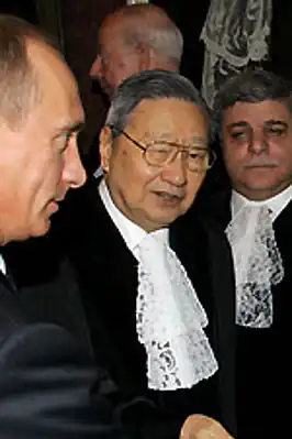 Shi in een ontmoeting met Vladimir Poetin in 2005