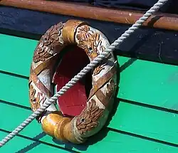 Een kleine lauwerkrans op het achterschip