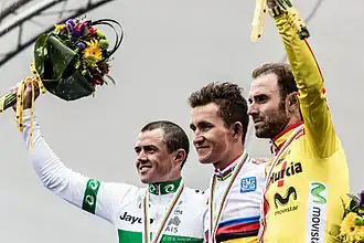 Het podium van de wegwedstrijd voor mannen: Simon Gerrans (links, zilver); Michał Kwiatkowski (midden, goud); Alejandro Valverde (rechts, brons)