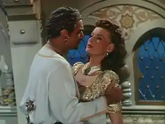 Scène met Douglas Fairbanks jr. en Maureen O'Hara aan boord van het schip van Sinbad