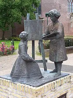 Bronzen beeld van Rembrandt en Saskia