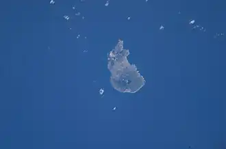 De zee rond St Eustatius (National Marine Park) gezien uit ISS