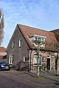 Woonhuis (complex van 20 woningen)