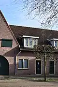 Woonhuis (complex van 20 woningen)