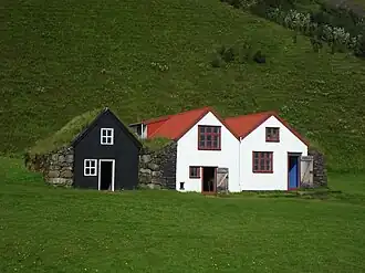 Woningen van golfplaat