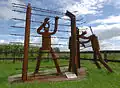 In 2002 door leerlingen van een plaatselijke MTS gemaakte stalen gedenksculptuur
