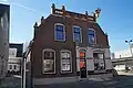 Winkel met woning