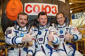 van links naar rechts: Chris Hadfield, Roman Romanenko en Thomas Marshburn