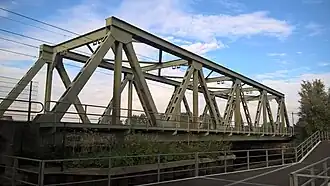 Spoorbrug Kethel met fiets- en voetgangersbrug.